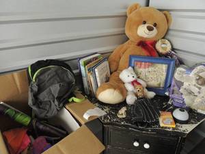 lot 75 image: Kids lot- large bear, posters, back pack, books, ceiling star light baseball glove, and more.