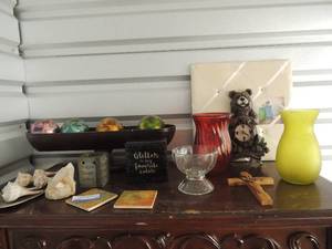 lot 56 image: Home dcor lot- trinket box, large white quartz crystal, shells, multiuse media board, vases Jerusalem, bear clock, and more