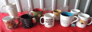 lot 236 image: 12 coffee cups-  Never going to give up Happy divorce we never liked him Charlie brown and more
