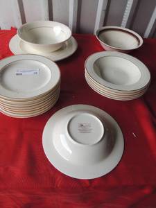 lot 239 image: New Elegance JC Pennys dish wear- 1 platter, 1 serving bowl, 8 dessert plates, 6 soup bowls, and 1 stoneware bowl