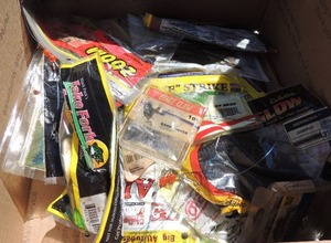 lot 256 image: Fishing supplies- jigs, hooks, worms, several packs