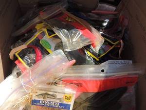 lot 257 image: Fishing supplies- jigs, hooks, worms, several packs