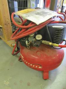 lot 8 image: Porter Cable jet stream air compressor Rod like new  works great. Original paperwork Model #CF 2600