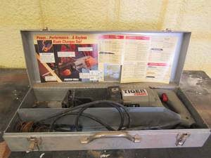 lot 15 image: Porter tiger cable saw in original case works