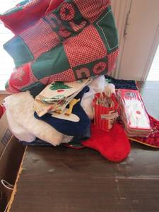 lot 79 image: Christmas stockings, foam door hangers, mini ornaments, christmas blanketsthrows