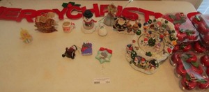 lot 104 image: Christmas dcor lot including 6 boxes of apple ornaments
