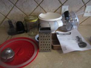 lot 110 image: Aluminum bread pan, hand cheese grater, Bowl, B&D food processor and toastmaster food chopper