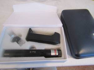 lot 133 image: Blue empty case and green laser pointer in box