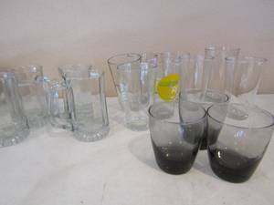 lot 137 image: Glassware- beer mugs, tea glasses, juice glasses