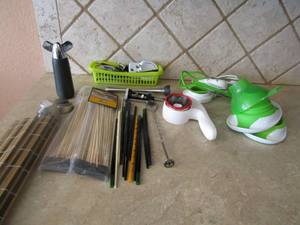 lot 141 image: Sushi rollers  Chop sticks, cork screw skewers and more