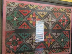 lot 10 image: WOVEN TAPESTERY FROM Kyrgyzstan  Framed  56x43