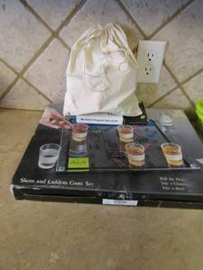 lot 166 image: Bag it up  game and shoots and ladders