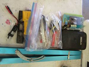 lot 45 image: Bag of crimpers, ring stapler, mini levels and more