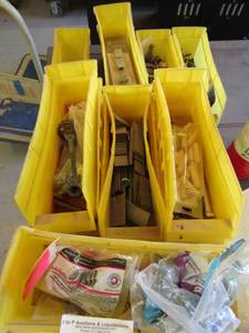 lot 206 image: yellow caddies full of screws ,bolts, nuts and more