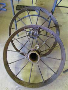 lot 214 image: 2 VERY HEAVY antique wagon wheels