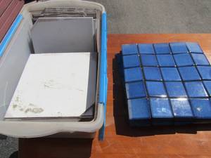 lot 230 image: Clear tote of square  tile &N  sheets & AQUA  Blue netted tile