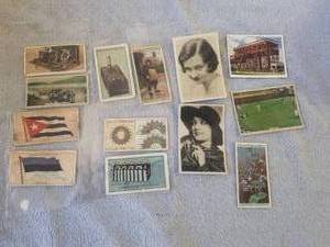 lot 128 image: Selection of 13 cigarcigarette insert cards