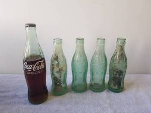 lot 119 image: Selection of old coke bottles