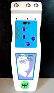 lot 144 image: Dermal Tone Facial Exerciser Treatment Lifts Tightens Face wCharger