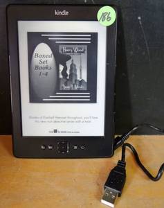 lot 186 image: Amazon D01100 Kindle 4th Generation 2GB Wi-Fi 6 inch eBook Reader - Graphite