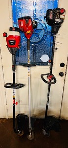 lot 19 image: Troy-Bilt TB25cs  Homelite Mighty Lite 26ss  Craftsman 27cc Weedwacker