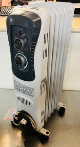 lot 64 image: Intertek Electric Radiator Heater Model HO-O270W