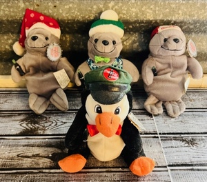 lot 165 image: Three Coca-Cola Seals and One Penguin