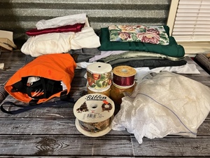 lot 192 image: Sewing Materials - Bolts of Cloth, Remnants, zippers, Elastic, Wired Ribbon and Lace