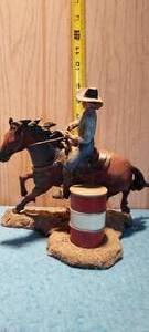 lot 8 image: Decorative plastic barrel racing statue