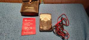 lot 17 image: Vintage Triplett Ohm Meter with original instruction book and leather case