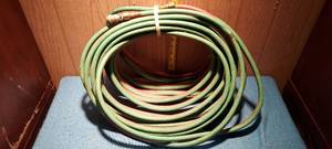 lot 54 image: roll of oxygenacetylene hoses
