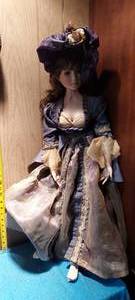 lot 69 image: Very tall (about 36) vintage porcelain doll
