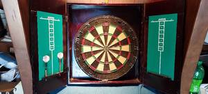 lot 75 image: Dart board in wooden case