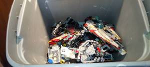 lot 77 image: Large assortment of legos and lego figures.