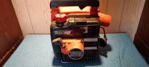lot 84 image: Echo Motor for leaf blower.  no tube.  engine turns over.  no spark plug.  not tested
