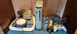 lot 102 image: Xbox 360 lot.  Game console, foot pedals, wireless controller and portal of power.  powers on
