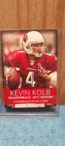 lot 107 image: Bruner Chevy 100 Kevin Kolb Autographed commemorative card.  Authenticity unknown