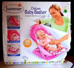lot 39 image: NEWOPEN BOX - SUMMER Deluxe Baby Bather 18515A, Pink, 3-Position Recline, Foldable $$