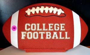 lot 44 image: UNIQUE Football Shaped College Football Book