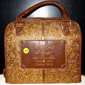 lot 193 image: COMING SOONBEUATIFUL RELIGIOUS INSPIRED CLUTCH BAG WITH NOTEBOOK AND SIGNED EDITION OF T D JAKES INSTINCT