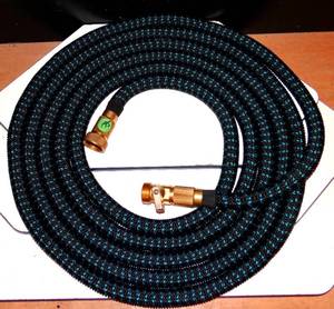 lot 195 image: LARGE EXPANDABLE HOSE WITH BRASS FITTINGS $$