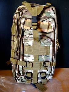 lot 292 image: NEW CAMO STYLE BACK PACK WITH MULTI COMPARTMENTS - REMOVED FROM BAG FOR PHOTO $$
