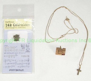 lot 92 image: 14kt gold chain with 10kt gold cross pendant, 10kt gold lapel pin and 24K gold sticker