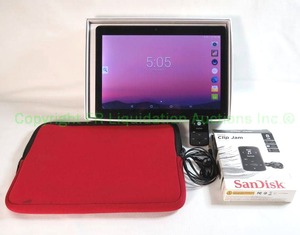 lot 19 image: Android tablet with case and SanDisk Clip Jam 8GB MP3 player