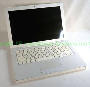 lot 24 image: 2007 Apple MacBook, 13 inch screen, MacOS version unknown, no power cord
