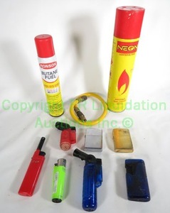 lot 54 image: Lighters and Ronson and Neon butane fuel cans