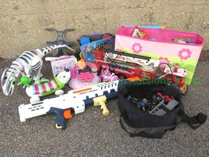 lot 11 image: Miscellaneous childrens toys, including Hot Wheels, Disney, Super Soaker and more