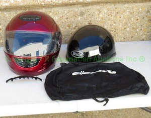 lot 32 image: Bilt half helmet, motorcycle helmet, and Electro sack