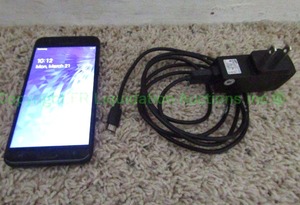 lot 68 image: Samsung Galaxy with Charge Cord
