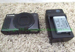 lot 75 image: Canon PowerShot SX620 HD camera with extra battery and charger